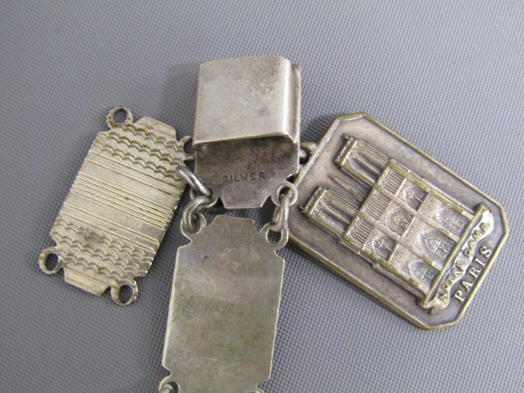 H.J Darracott silver pocket watch, silver bracelet with Paris pendant, silver ingot with white metal - Image 6 of 8