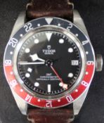 Gents Tudor GMT stainless steel wristwatch on leather strap, serial number 1865926, model 79830RB