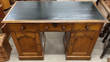 Victorian oak twin pedestal desk with gothic design influence L117cm D 58cm Ht 75cm