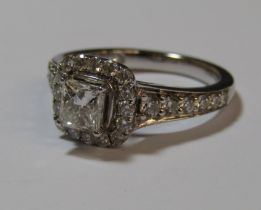 18ct white gold diamond ring with central princess cut 0.60ct diamond measuring 4.73 x 4.51 x 3.