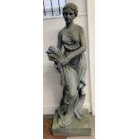 Classical garden statue of a young lady with a basket of wheat, of composite construction, Ht 161cm