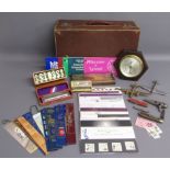 Small suitcase containing bookmarks, Hohner Super Chromonica, Hohner Echo Super Vamper harmonica,