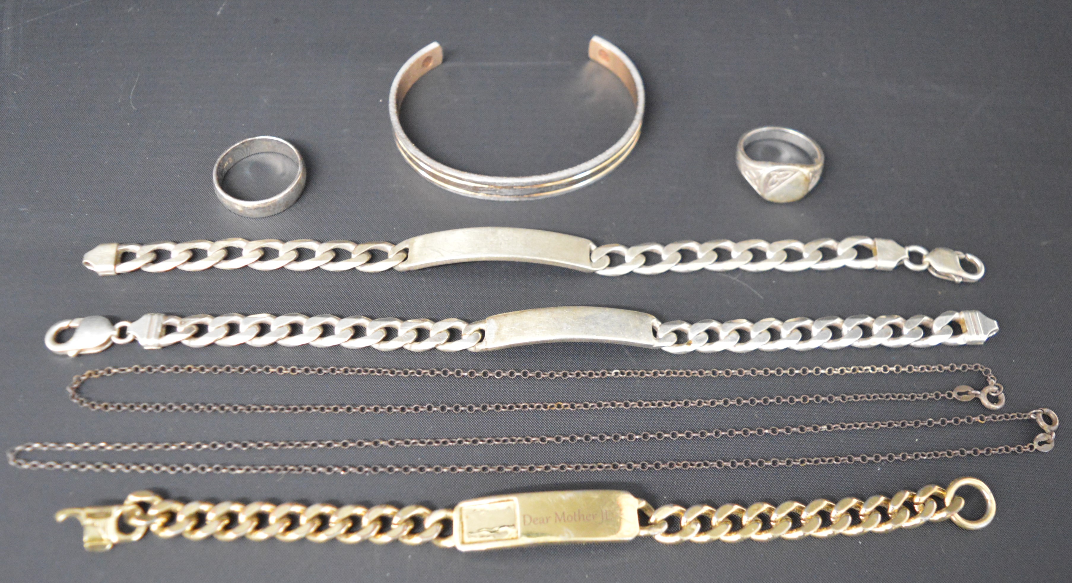 2 silver identity bracelets, 2 silver necklaces, 2 gents silver rings total weight 2.85ozt &