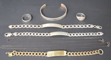 2 silver identity bracelets, 2 silver necklaces, 2 gents silver rings total weight 2.85ozt &