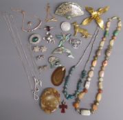 Mostly silver jewellery - brooches, necklaces also some possibly gold mounted pendants and small