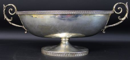 Large Italian silver gilt twin handled dish marked 14 MI 800, with planished decoration,38cm wide,