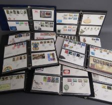 9 albums containing first day covers - 3 albums with Jersey First day covers