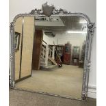 Large ornate Victorian overmantel mirror which has been painted silver W 182cm H 196cm