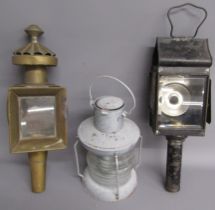 2 carriage lamps and a candle lamp