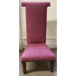 Victorian high back hammerhead chair on turned legs