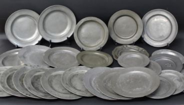 Twenty seven 18th / 19th century pewter plates, mostly unpatinated