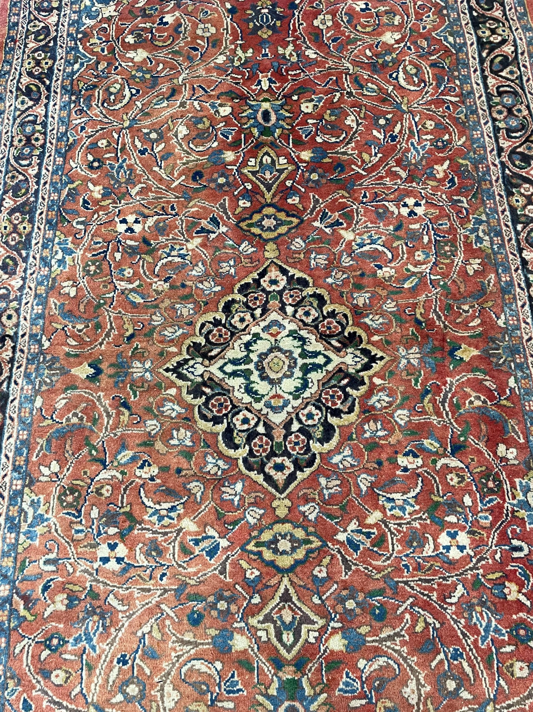 Washed red ground full pile Persian Sarouk runner with floral medallion 340cm by 160cm - Image 2 of 3