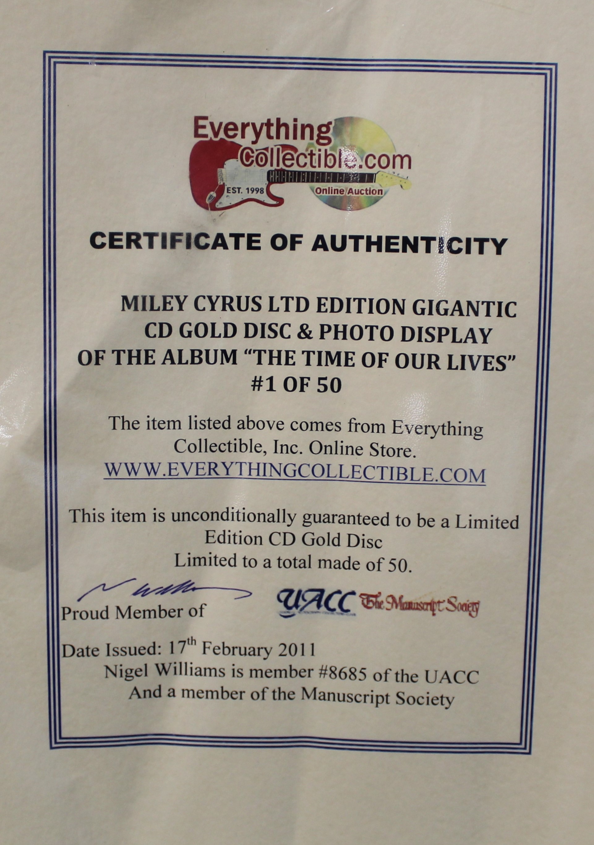 Framed Miley Cyrus limited edition "Gigantic CD Gold Disc & Photo Display of the Album "The Time - Image 2 of 2