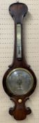 Victorian barometer in a rosewood case with silvered dial