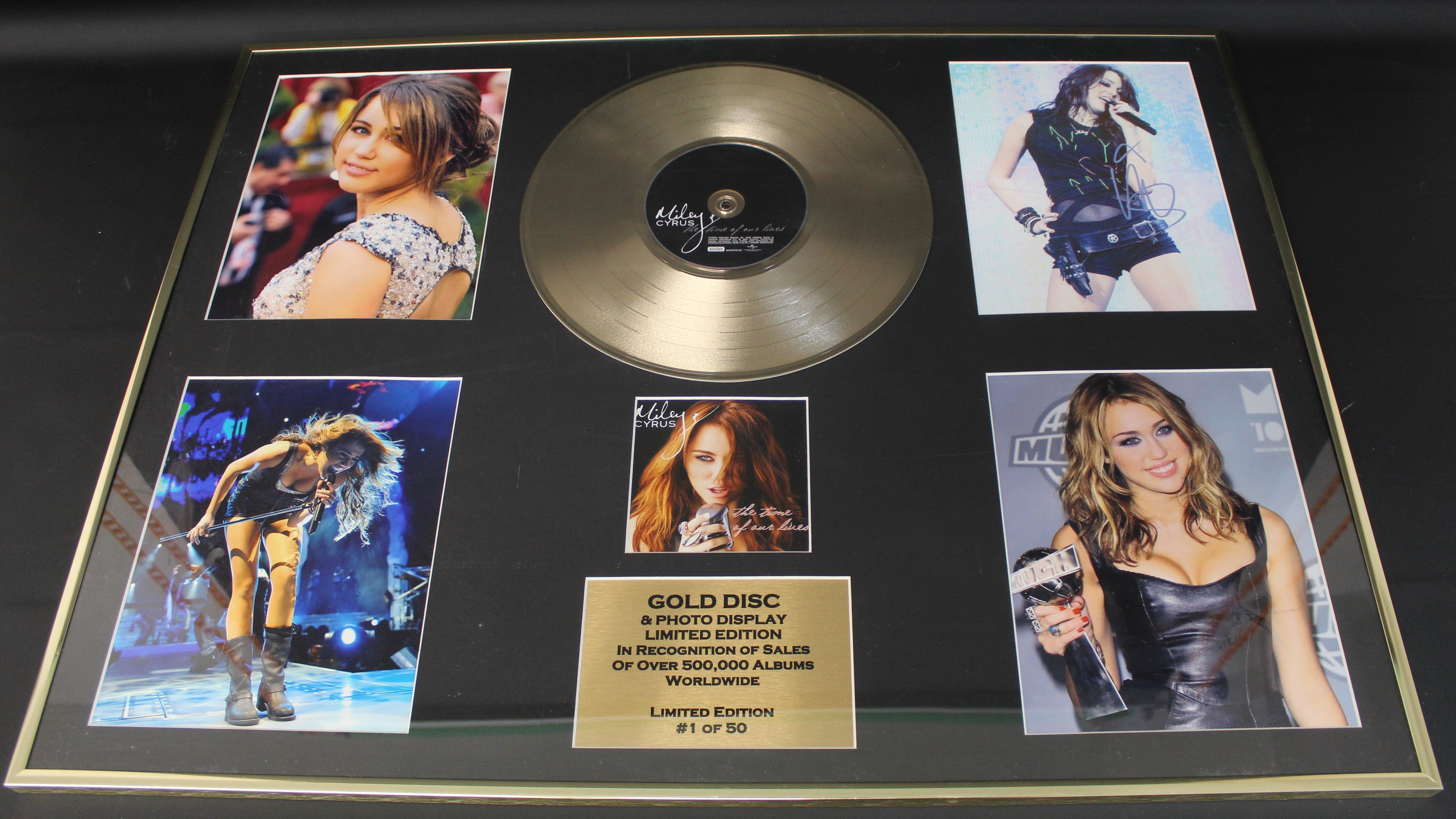 Framed Miley Cyrus limited edition "Gigantic CD Gold Disc & Photo Display of the Album "The Time