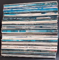 Approximately 74 classic rock & pop LP's including Fleetwood Mac, The Eagles, Wings, ELO, Abba,