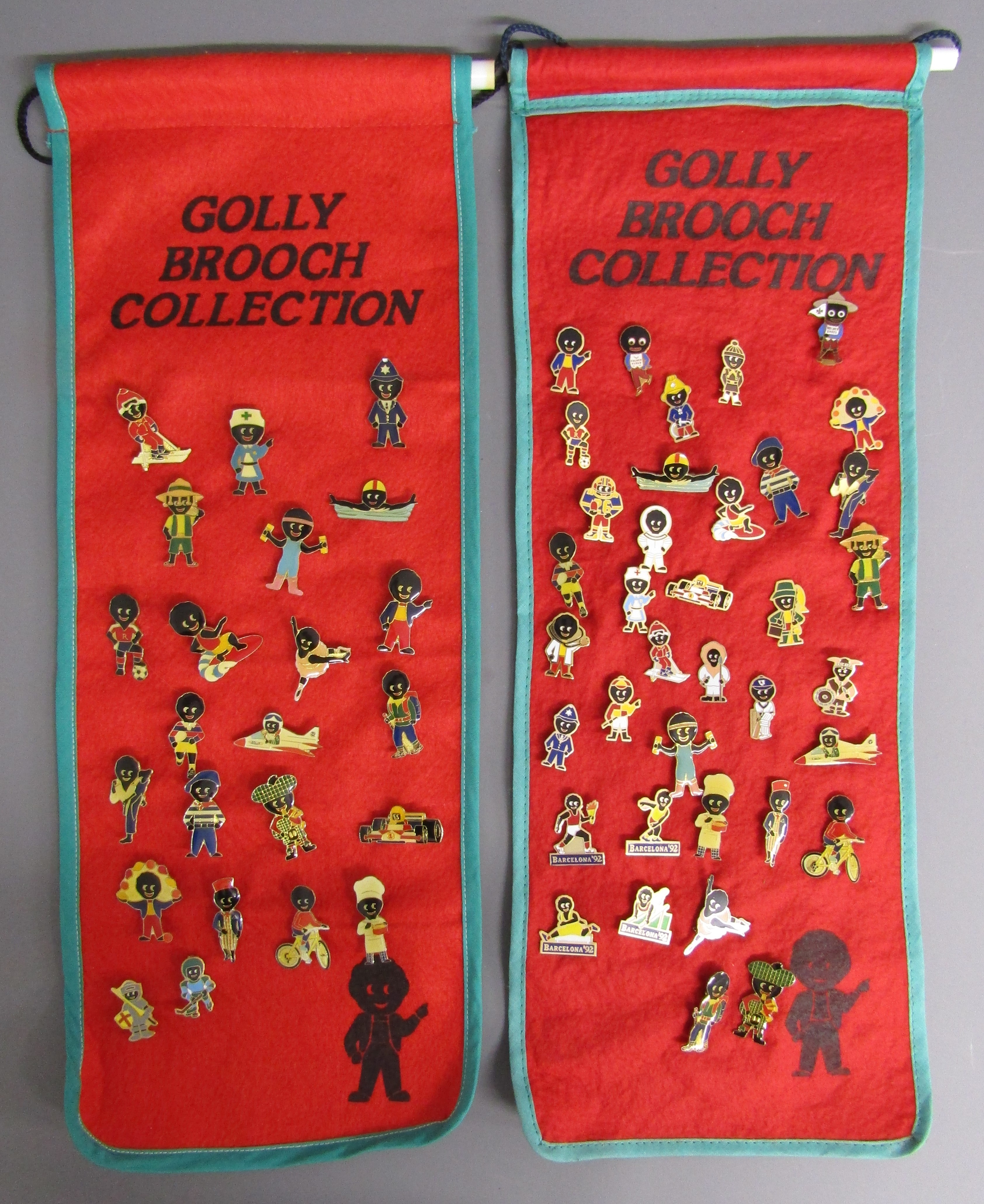 Robertson's Golly brooch collection on two hanging scrolls