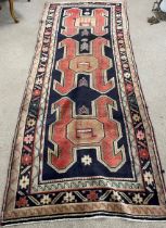 Deep ground Iranian village runner with all over design 297cm by 119cm