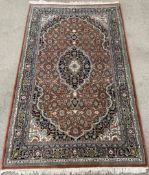 Multi colour Persian wool rug 187cm by 117cm