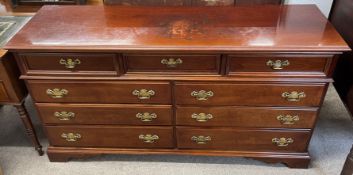 Virginia hardwood chest of drawers. Damage to top Ht 85cm W 156cm D 46cm