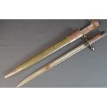 World War One era United States bayonet with green leather scabbard & leather frog with metal clip