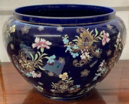 Large blue ground jardinière with floral decoration (crack). Ht 27cm D 38cm