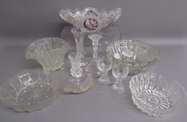 Collection of crystal and cut glass, includes bowls, vases, candle holder, glasses etc