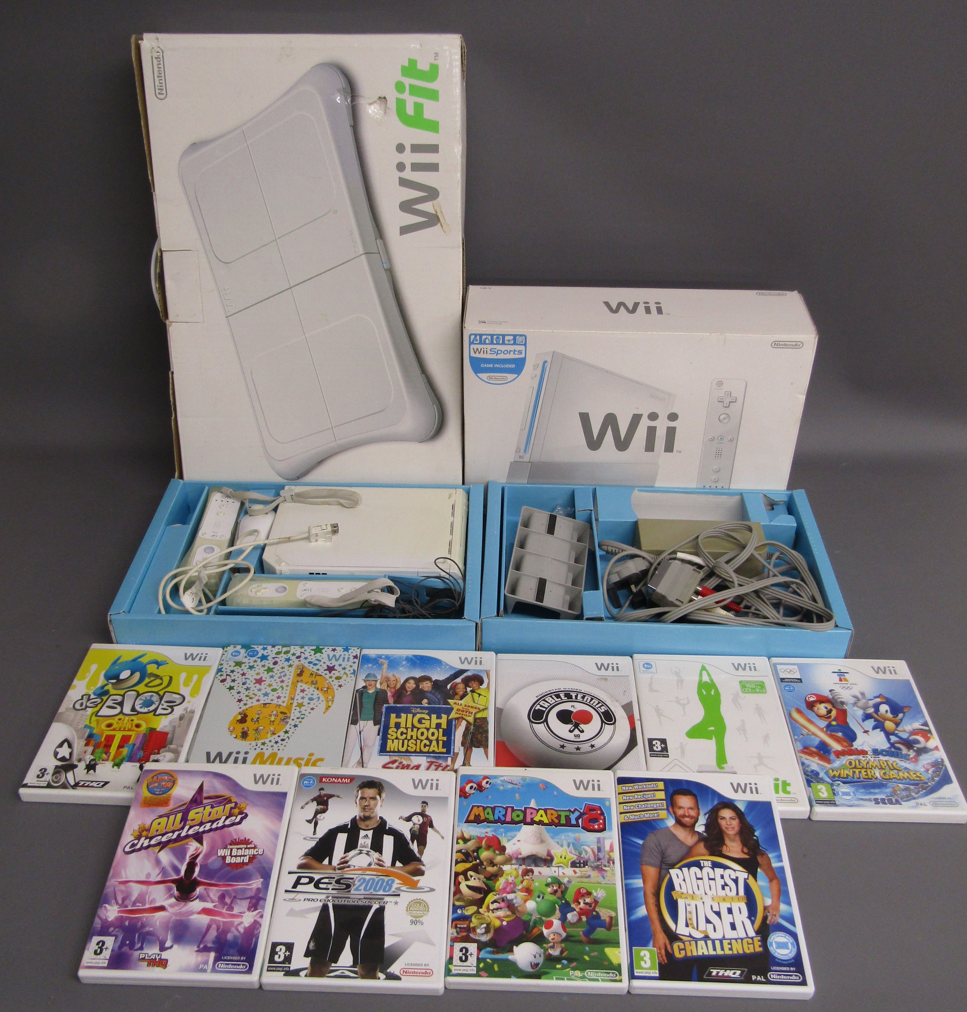 Nintendo WII consoles, WII fit board and games including Mario Party 8 (advised Cheerleader is