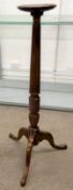 Mahogany torchère plant stand on a reeded column Ht 135cm