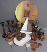 Collection of items includes African shield painted canvas, wooden home items, wooden figures,