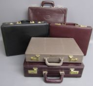 5 briefcases - 3 red, one fawn Custom and 1 black