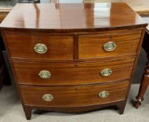 Georgian bow fronted chest of drawers on bracket feet in mahogany with plate brass handles W 88cm Ht