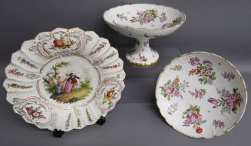 Pair of 19th century comports with hand painted floral decoration, bearing under-glazed blue crossed