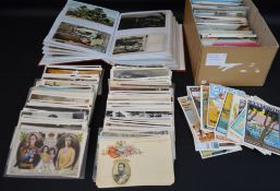 Approximately 450 assorted postcards including topographical, tourist, humorous, real photographic