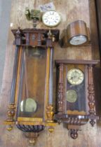 2 wall clocks and a mantel clock