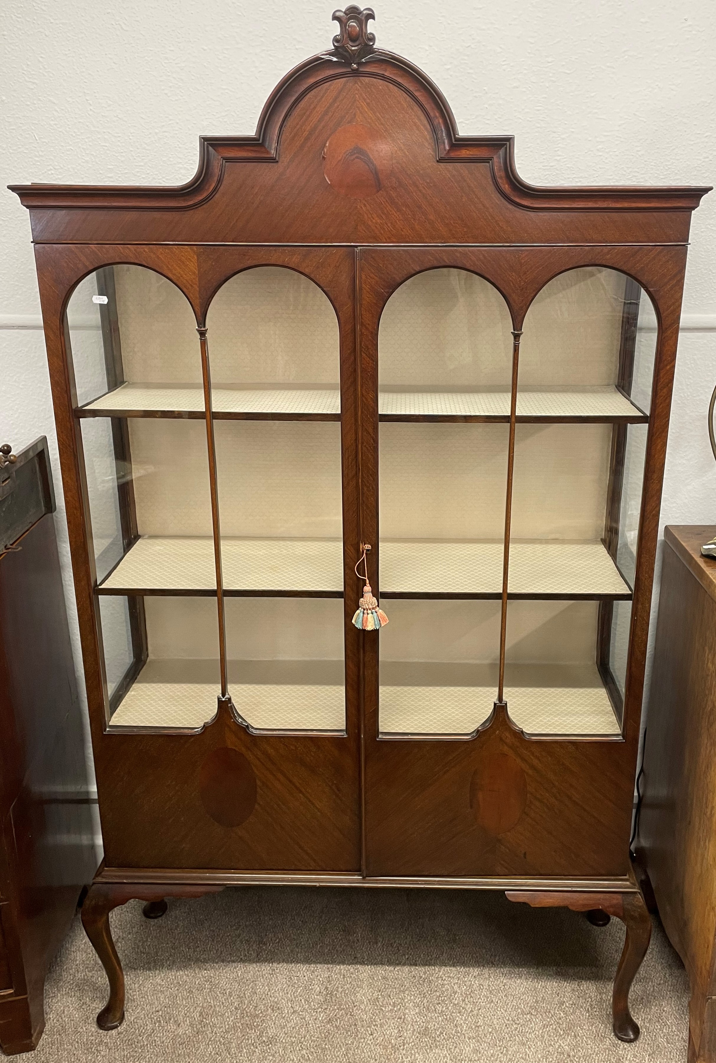 Early 20th century display cabinet on cabriole legs Ht 198cm W 118cm D 38cm