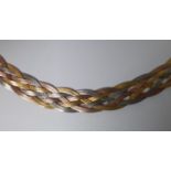 Plaited three colour gold necklace marked 750, 17.4g