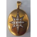 19th century tested as 18ct gold locket decorated with pearl set star framed by blue enamel, 27.89g,