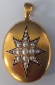 19th century tested as 18ct gold locket decorated with pearl set star framed by blue enamel, 27.89g,