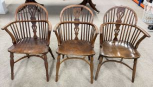 Set of 3,or near matching, 19th century yew wood Windsor chairs with crinoline stretchers