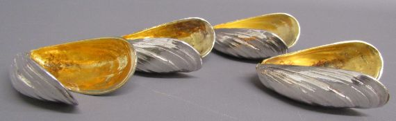 Set of four silver gilt mussel eaters fashioned as mussel shells joined by a sprung hinge, TP
