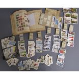 Stamp album along with a collection of cigarette collectors cards includes Sunripe & Spinet Oval
