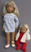 2 Sasha dolls - blonde hair blue eyes with gingham dress and baby white hair brown eyes