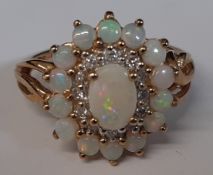 Opal & diamond (check) cluster ring marked 375, size K / L, 2.8g