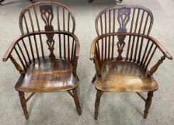 Two 19th century yew wood Windsor chairs with crinoline stretcher (one support needs re-attaching