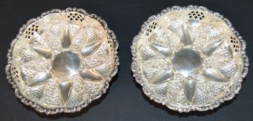 Pair of Victorian pierced silver dishes with embossed decoration (possibly Miller Bros),