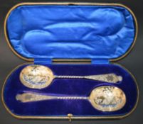 Pair of cased Victorian silver spoons with bright cut engraved decoration & twisted stem, Wakely &