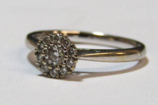 18ct white gold round brilliant cut diamond cluster ring, 0.26ct, SI1, colour G, - ring size M