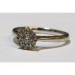 18ct white gold round brilliant cut diamond cluster ring, 0.26ct, SI1, colour G, - ring size M