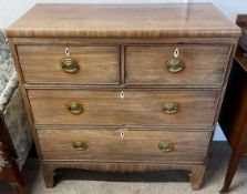Georgian mahogany chest of drawers with brass plate handles, bone escutcheons, cock beading to the